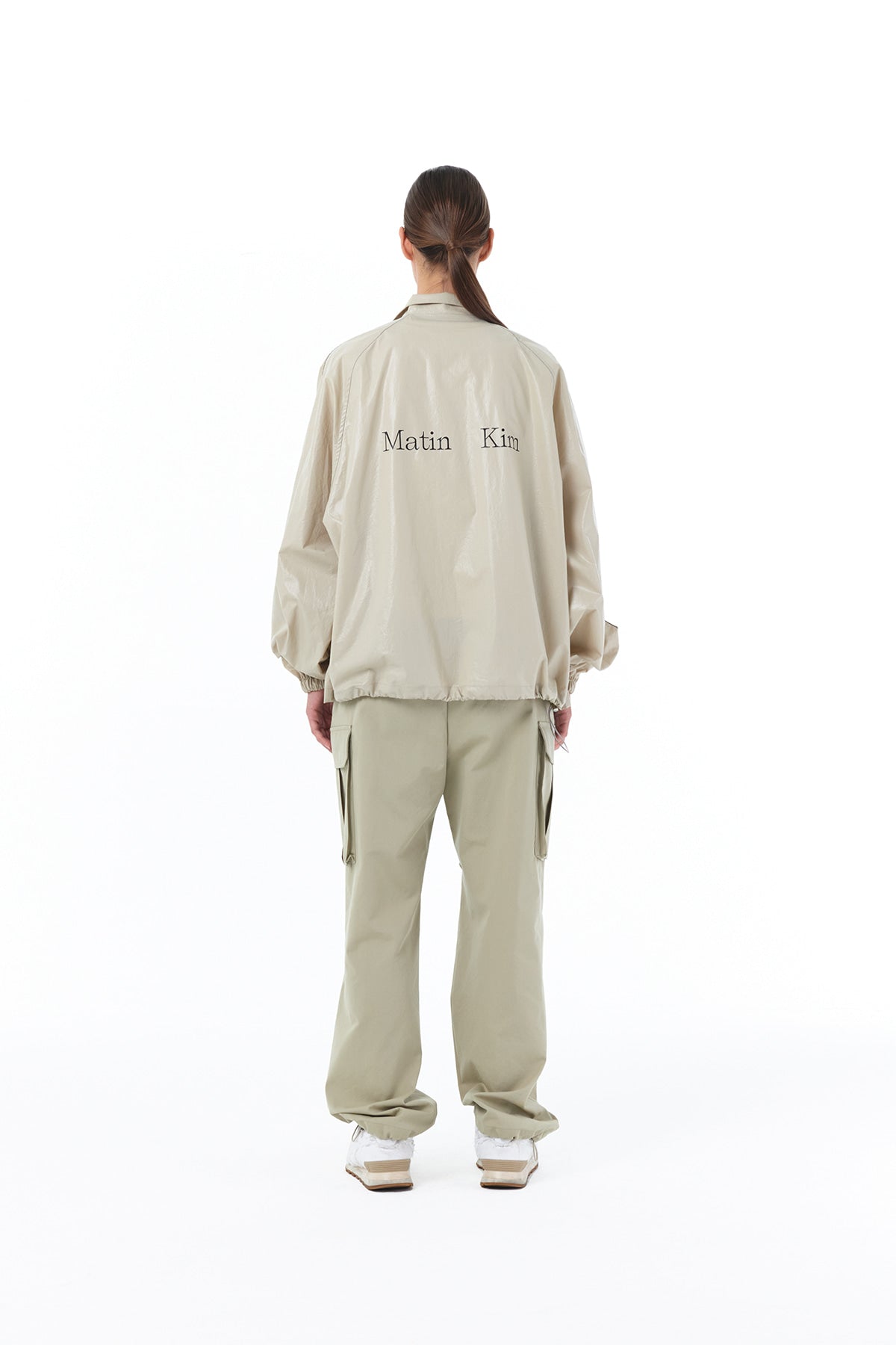 MATIN KIM LOGO COATING JUMPER IN BEIGE