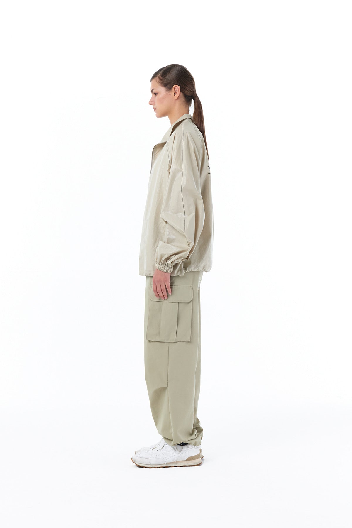 MATIN KIM LOGO COATING JUMPER IN BEIGE