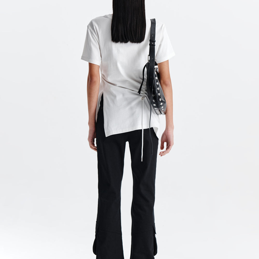 
                  
                    MATIN KIM STRING SLIT DETAIL TOP IN WHITE
                  
                