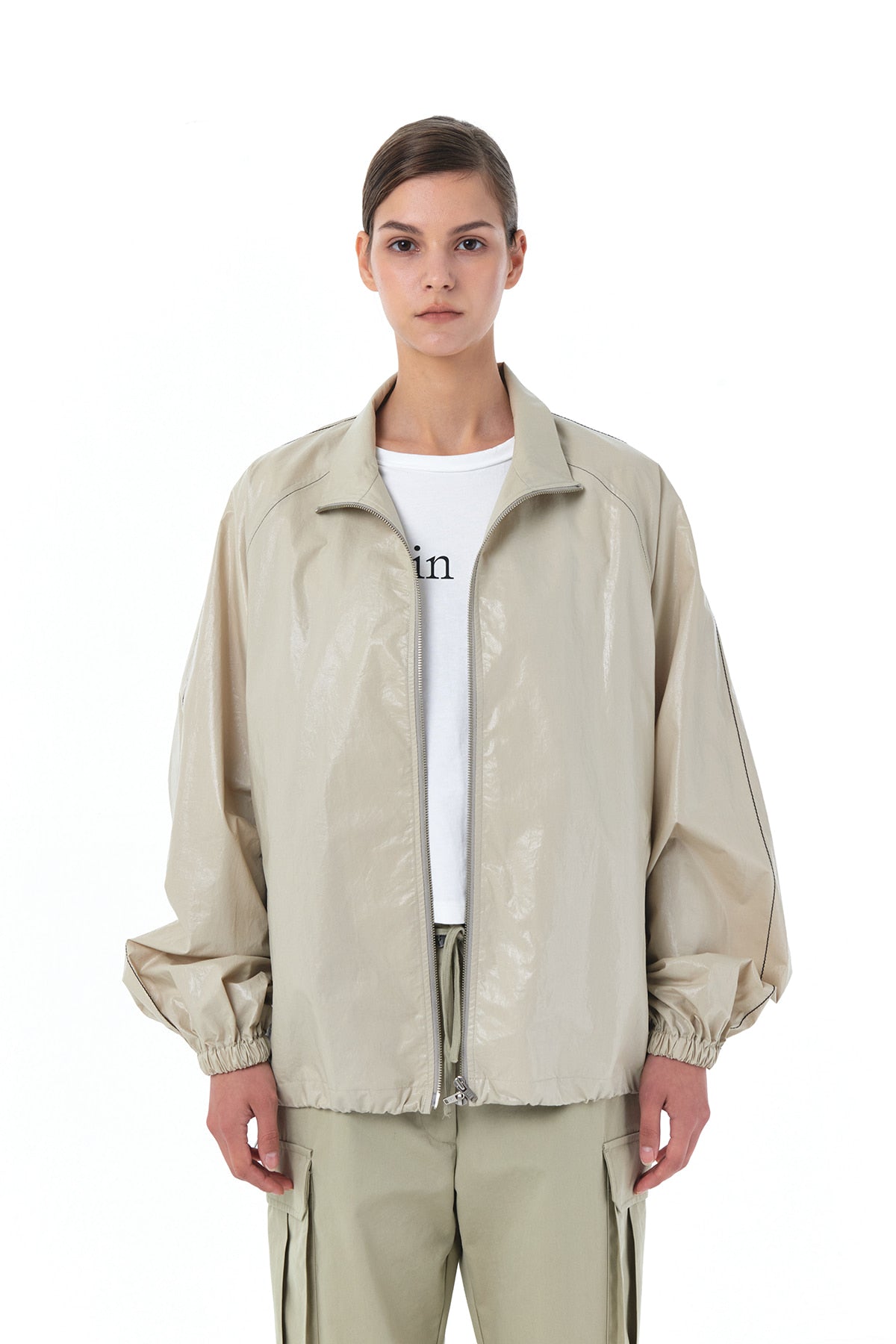 MATIN KIM LOGO COATING JUMPER IN BEIGE