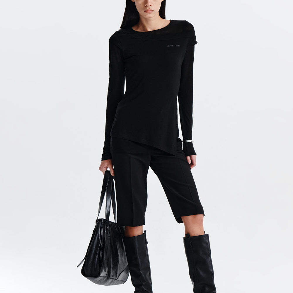 
                  
                    MATIN KIM SLIT POINT SLEEVELESS LAYERED TOP IN BLACK
                  
                