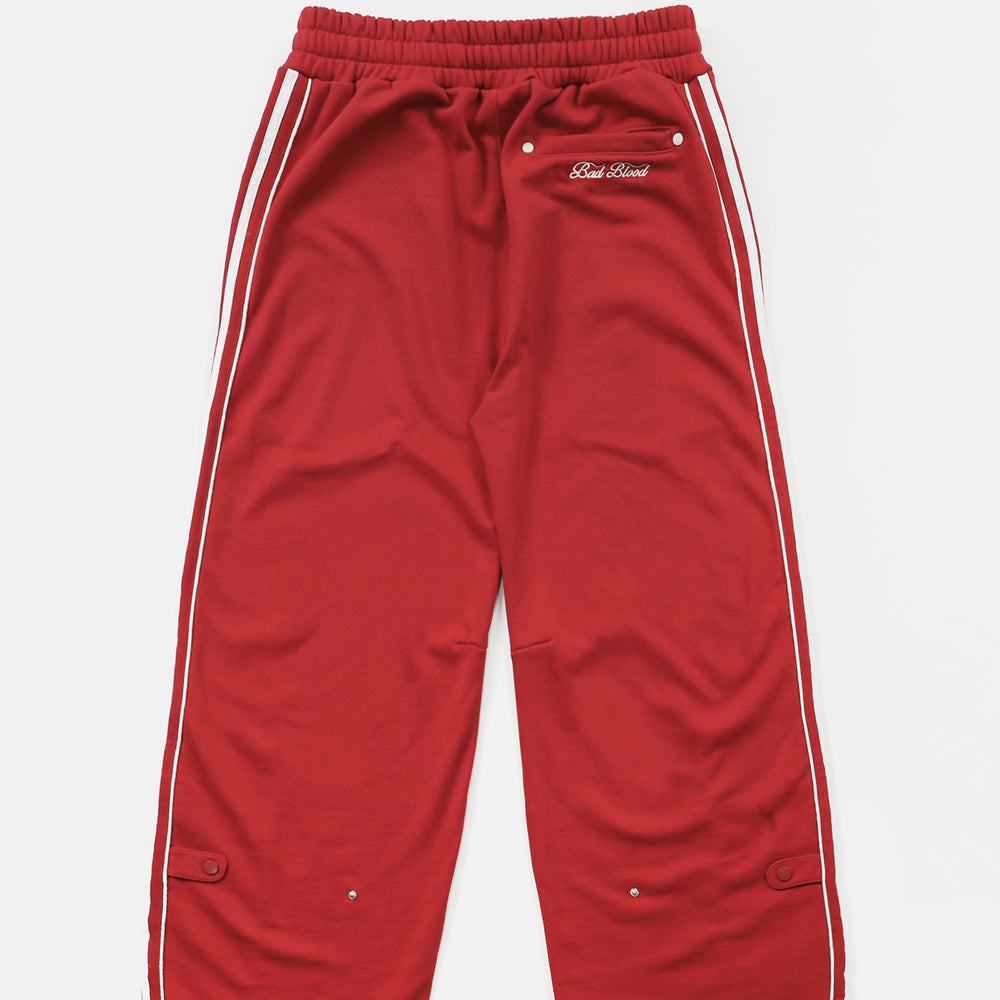 
                  
                    BAD BLOOD Billy 2 Way Curved Jogger Trousers - Red
                  
                