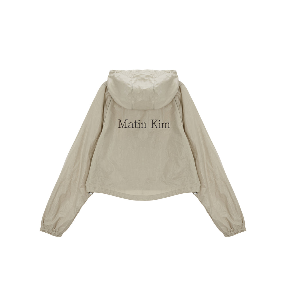 
                  
                    MATIN KIM CROP HOODY COATING JUMPER IN BEIGE
                  
                