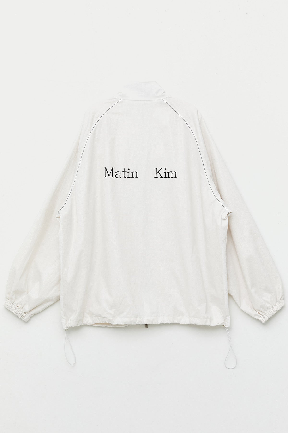 MATIN KIM LOGO COATING JUMPER IN IVORY – SeoulSeoul