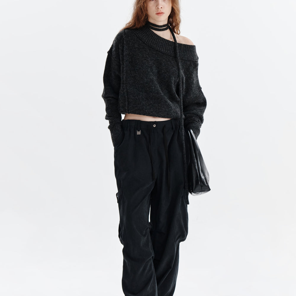 
                  
                    MATIN KIM OFF SHOULDER STRING KNIT PULLOVER IN CHARCOAL
                  
                