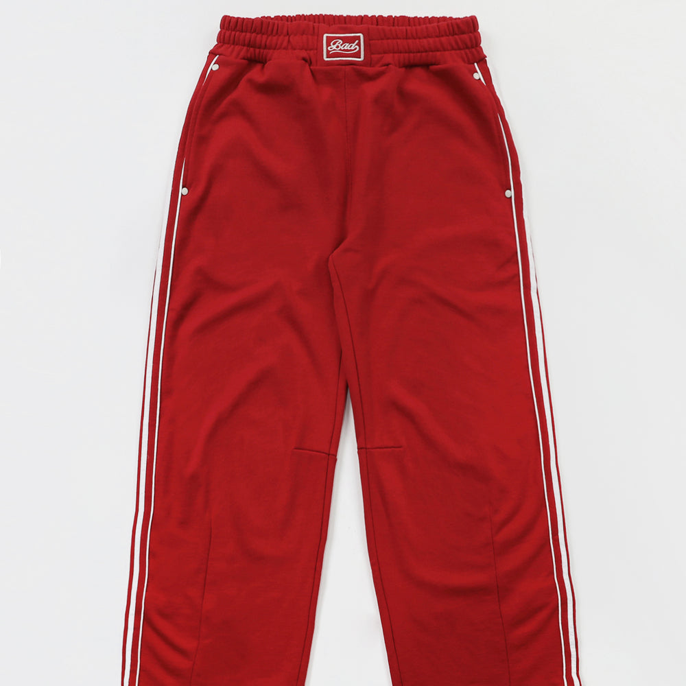 
                  
                    BAD BLOOD Billy 2 Way Curved Jogger Trousers - Red
                  
                