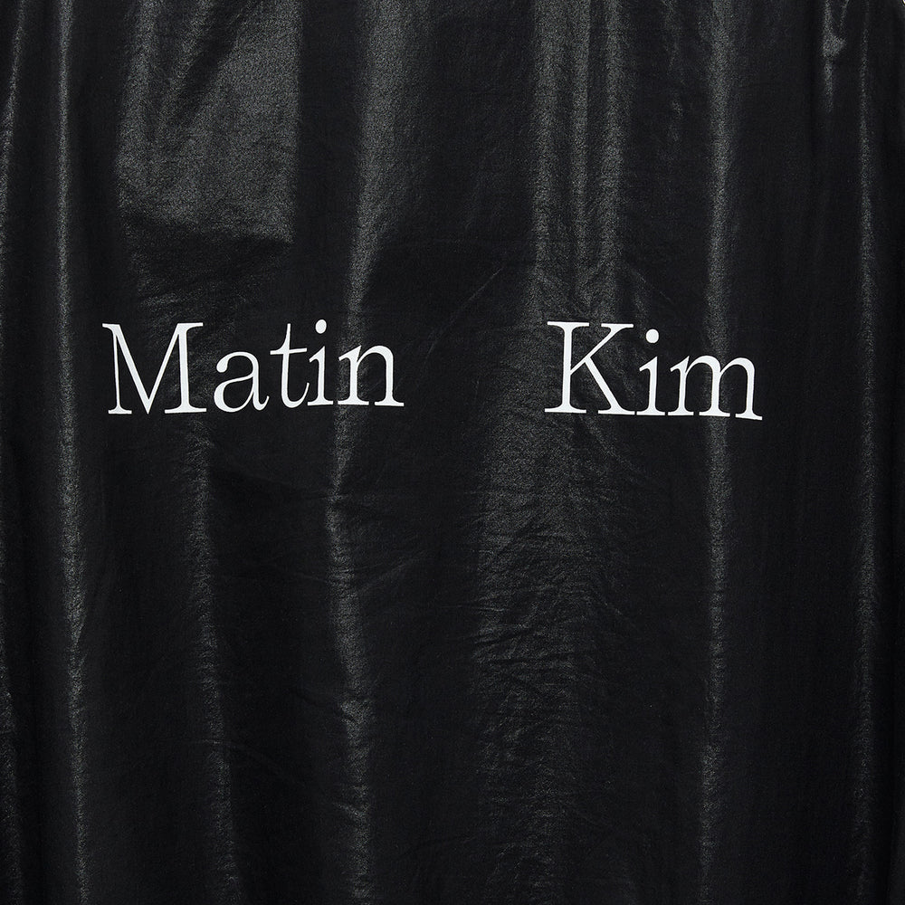 
                  
                    MATIN KIM LOGO COATING JUMPER IN BLACK
                  
                