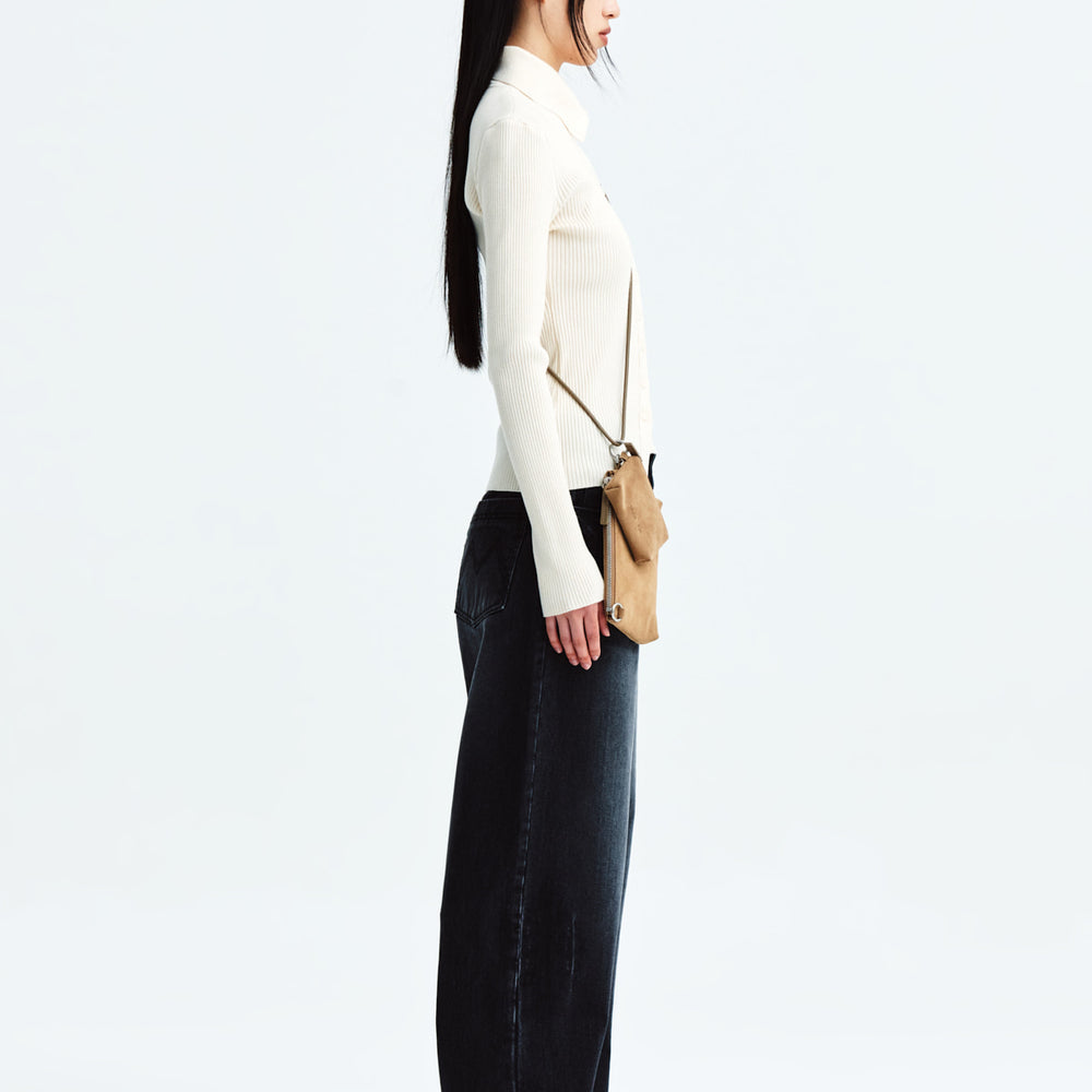 
                  
                    MATIN KIM DIAGONAL BUTTON POINT SLIM CARDIGAN IN IVORY
                  
                