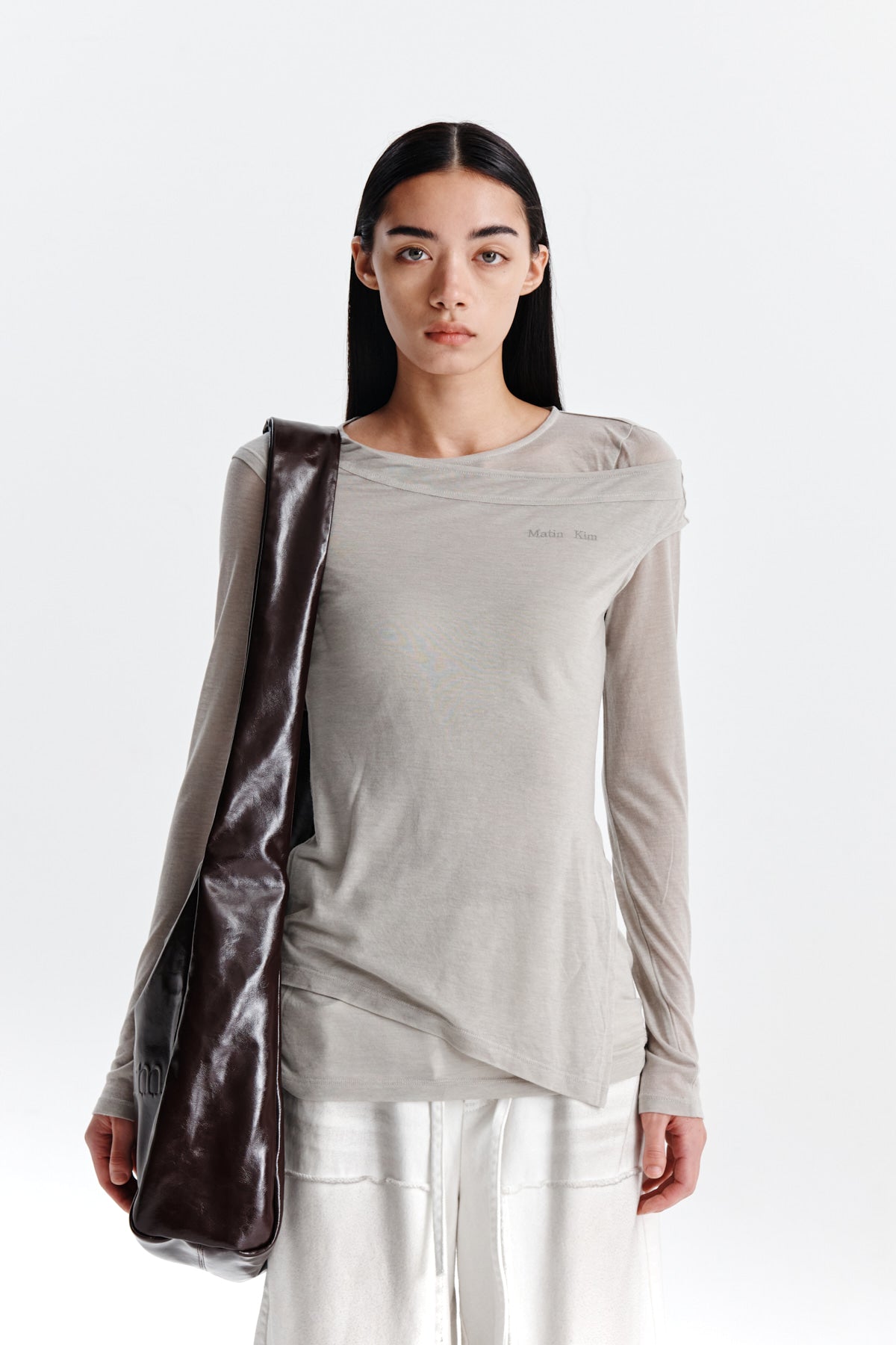 MATIN KIM SLIT POINT SLEEVELESS LAYERED TOP IN BEIGE