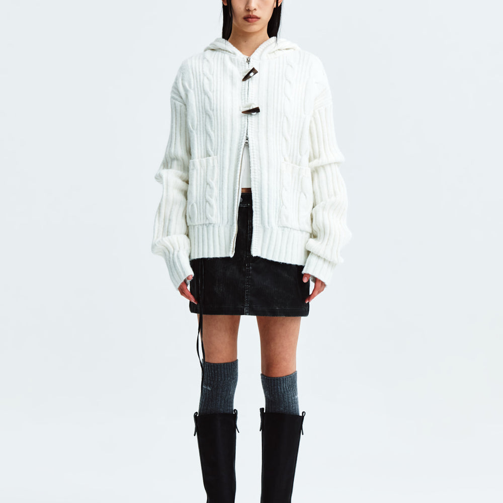 
                  
                    MATIN KIM CABLE KNIT HOODY TOGGLE CARDIGAN IN IVORY
                  
                