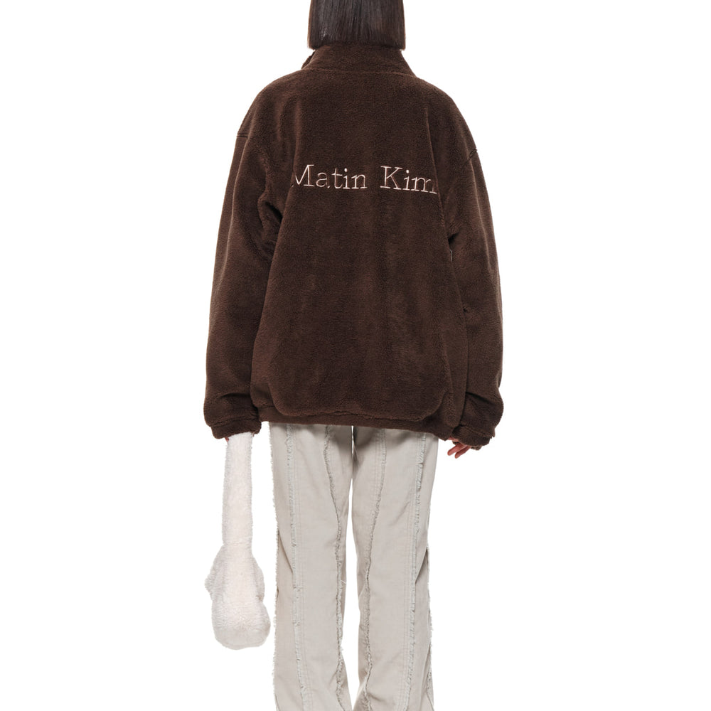 MATIN KIM MATIN FLEECE HIGH NECK JUMPER IN BROWN