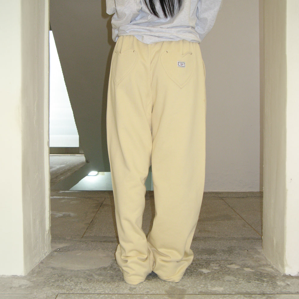 
                  
                    RONRON BACK HEART STITCH POCKET SWEAT JOGGER PANTS CREAM YELLOW
                  
                