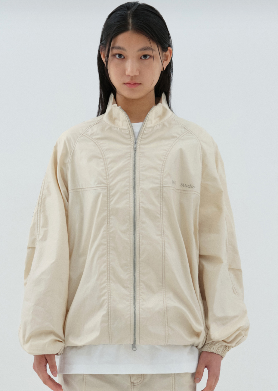 O!Oi LAYERED LOGO COATING WINDBREAKER IVORY