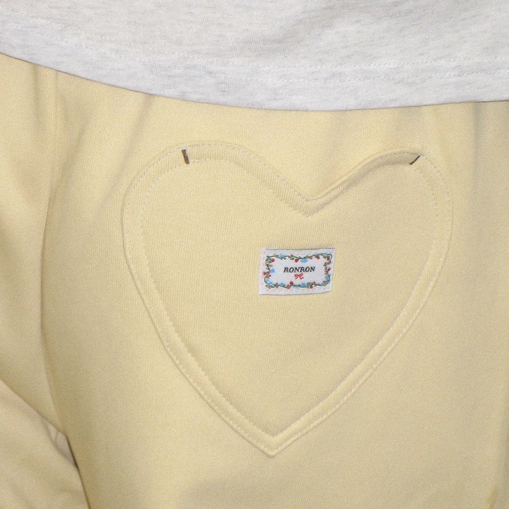 
                  
                    RONRON BACK HEART STITCH POCKET SWEAT JOGGER PANTS CREAM YELLOW
                  
                