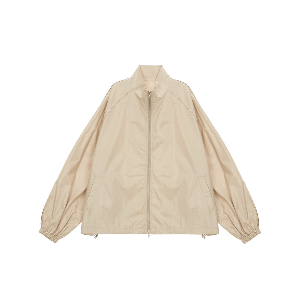 
                  
                    MATIN KIM LOGO COATING JUMPER IN BEIGE
                  
                