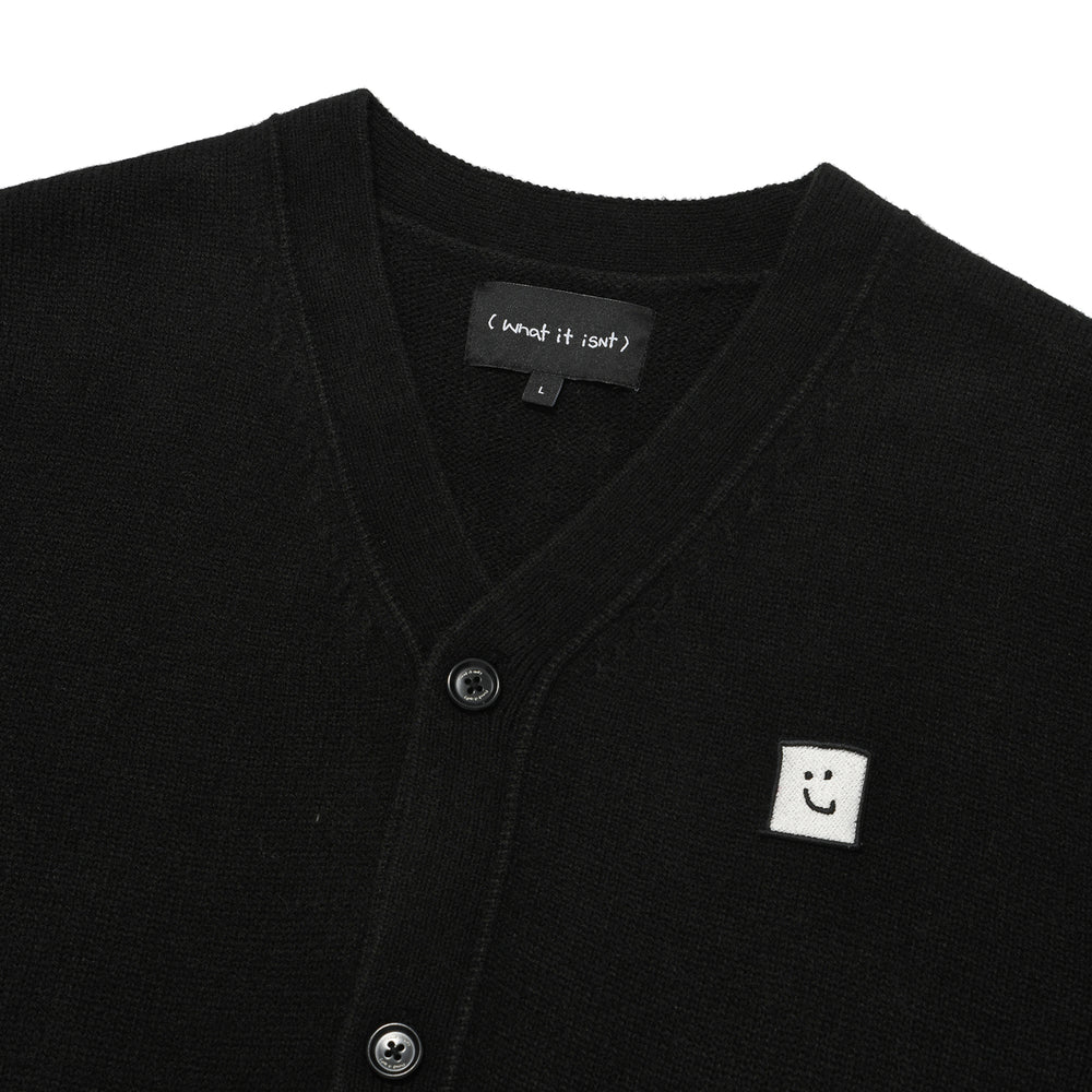 
                  
                    Wool V-neck Cardigan Black
                  
                