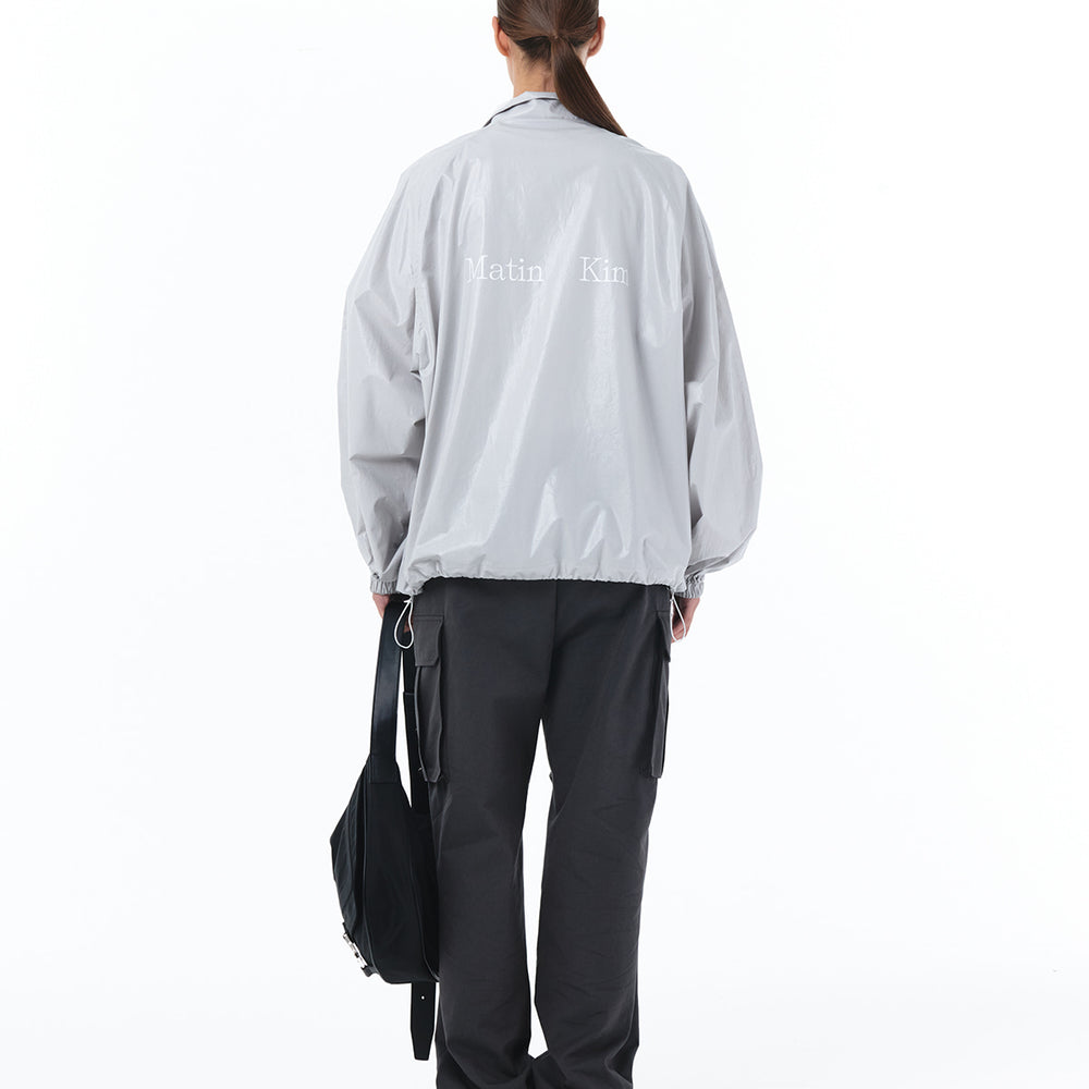 
                  
                    MATIN KIM LOGO COATING JUMPER IN GREY
                  
                