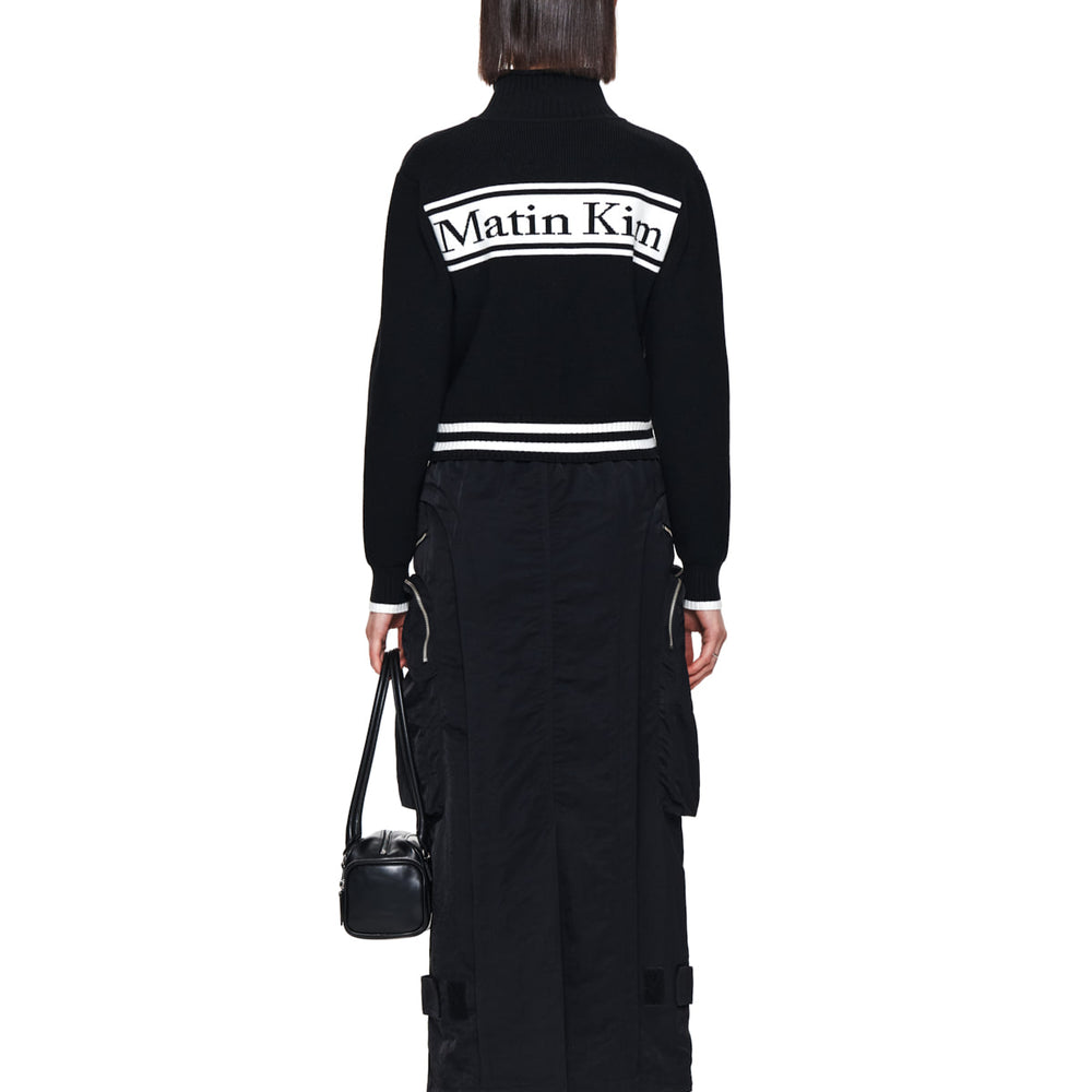 
                  
                    MATIN KIM SPELL POINT STRIPE KNIT CARDIGAN IN BLACK
                  
                